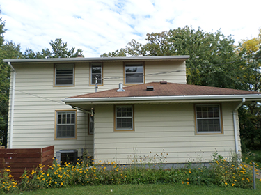 Before Roof & Siding Replacement