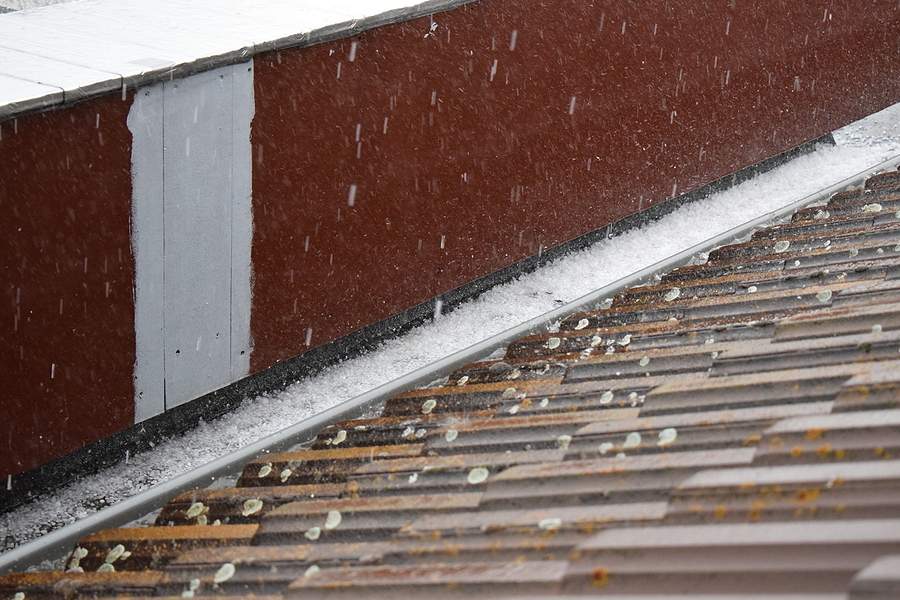 bigstock Hailstorm Crashing On A Roof W 475556219