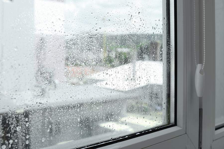 bigstock Window Glass With Water Drops 462400613