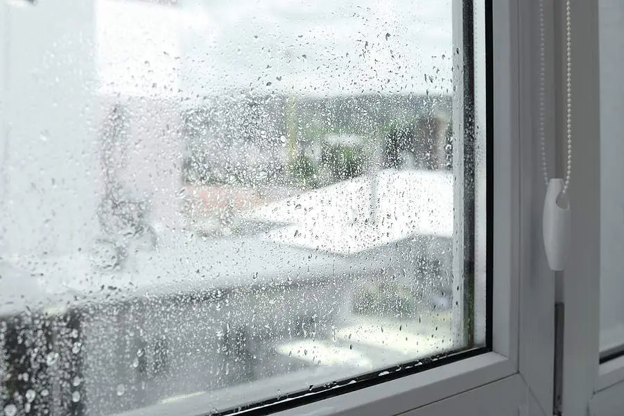 bigstock Window Glass With Water Drops 462400613